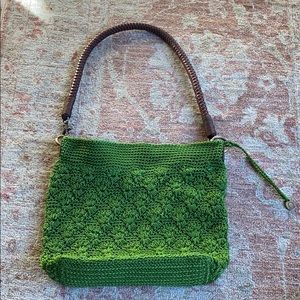 The Sak purse green crochet with leather accents.